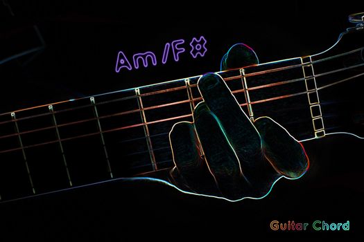 Guitar chord on a dark background