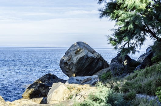 Beautiful rocks close to the ocean in Getaria city, Spain.