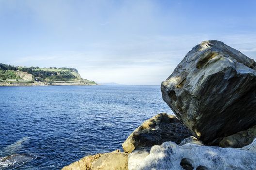 Beautiful rocks close to the ocean in Getaria city, Spain.