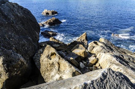 Beautiful rocks close to the ocean in Getaria city, Spain.