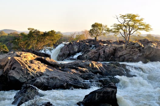 Ruacana Falls on the border of Namibia and Angola at sunrise.