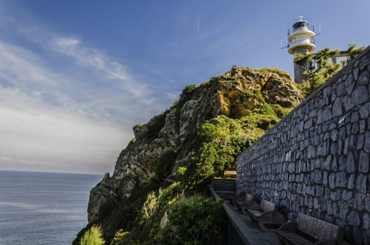 Looking at the lighthouse close to Getaria city in Spain. Beautiful environment and architecture.