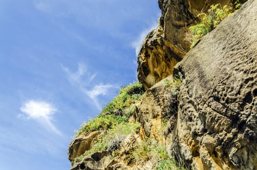 Beautiful yellow rock close to the Atlantic ocean.