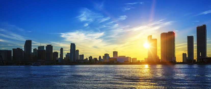 Miami city skyline panorama at dusk with urban skyscrapers