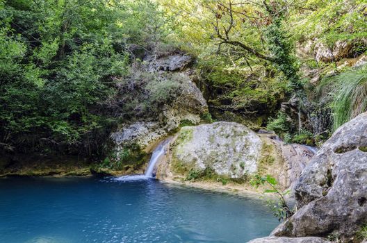 Beautiful waterfall in the river deep in to the Navarra's mountain in Spain.