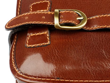 Details of Ginger Leather Traveling Bag with Pocket Bronze Rivet and Backstitch closeup on white background