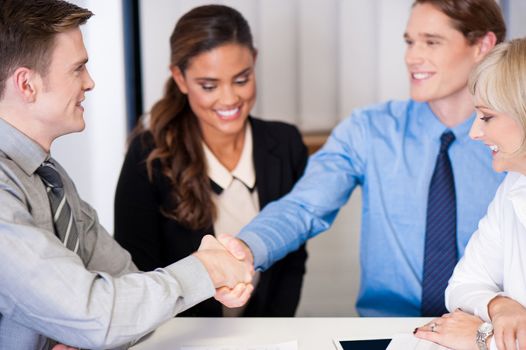 Businessmen shake hands to seal the deal