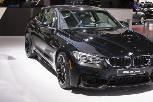 DETROIT - JANUARY 26 :The new 2015 BMW M4 coupe at The North American International Auto Show January 26, 2014 in Detroit, Michigan.