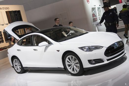 DETROIT - JANUARY 26 :The new 2015 Tesla Model S  full-sized electric five-door hatchback at The North American International Auto Show January 26, 2014 in Detroit, Michigan.