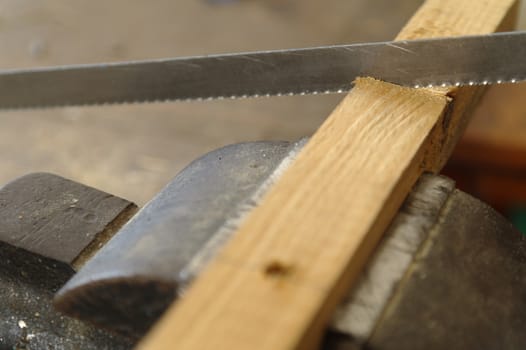 cutting wooden slat