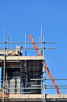 Ladder at angle on building site