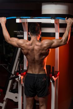 Man Working Out In A Gym