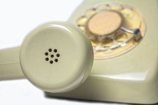 Vintage telephone receiver isolated on white background 