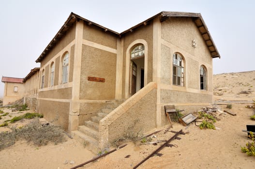 Ruin of the hospital at Kolmanskop near Luderitz in Namibia