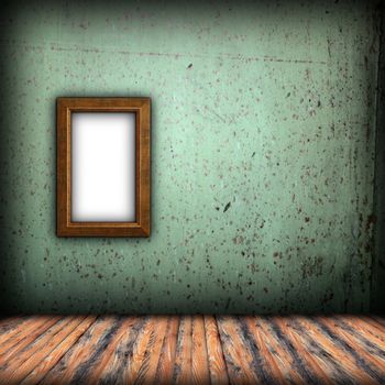 empty frame on indoor background with green grungy wall and wood floor