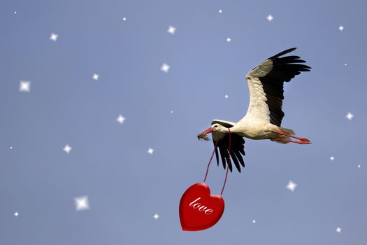 White stork with red heart on a blue sky.