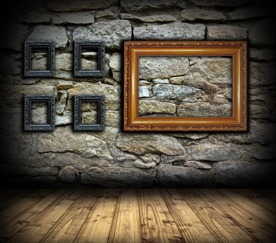 stone wall with old wood empty painting frames for interior design