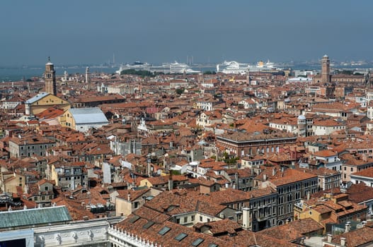 Cruise ships, buildings and houses in Venice, Italy.