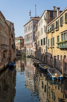 Boats and waterfront buildings in Venice, Italy.