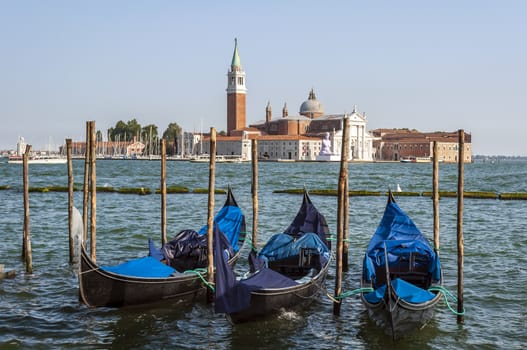 Gondolas in Venice, Italy, with St George Island in the background.