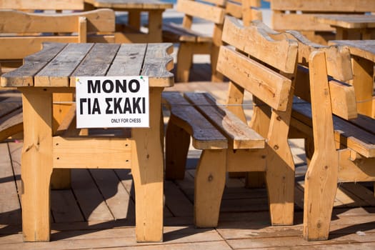 Tables reserved for chess-players, Chess is a very popular sport in greece and there are special places reserved for amateurs of chess. Greece, 2013.