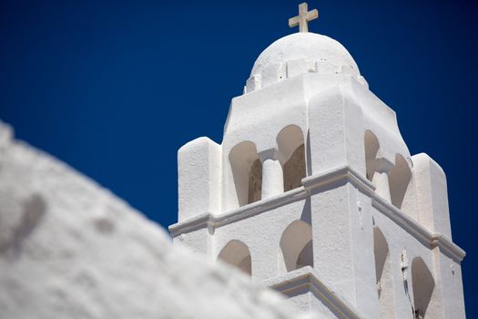 Close up from the facade and entrance of the  Gorgeous white orthodox church of Panagia of Chora, Island of Folegandros , Aegean sea. Greek 2013.