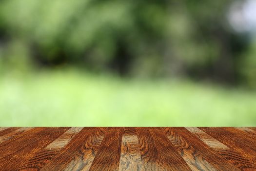 view to the green background from mahogany old wooden  terrace
