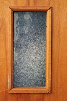 window in wood door