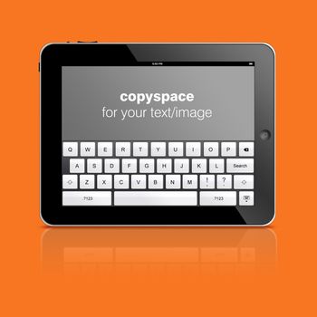 Tablet computer and keyboard with copy space to add your text or photo isolated on orange background.