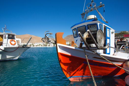 Little fishers boats on the aegean sea, fish is such an important part of the Greek diet. For such a small country there is a lot of coastline which is why they have such a strong history of seafaring. Eating seafood goes along with that.Greece, 2013.