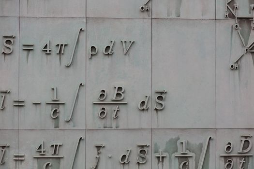 Detail of a mathematical formula on a facade of a building in Warsaw, Poland