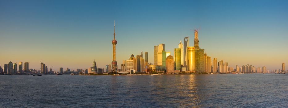 Shanghai skyline with reflection and Pudong during the sunset - april 2013
