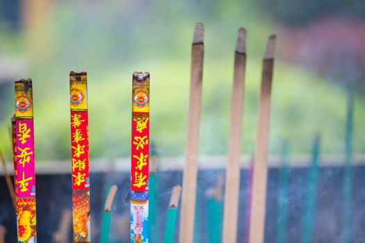 Burning Incense in a Temple in Hangzhou, the photo is taken from above a provide a very interesting view.