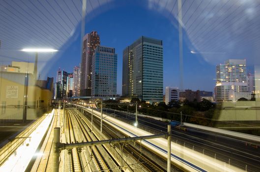 Tokyo by night with Shinkansen fast train at night