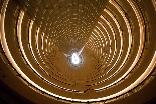 SHANGHAI, CHINA, APRIL 1: Interior view of the Jin Mao Tower. The Tower is an 88-story landmark skyscraper in the Lujiazui area of the Pudong district of Shanghai, People's Republic of China. It contains offices and the Shanghai Grand Hyatt hotel. April 2013