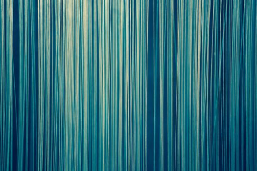 Blue abstract background made of vertical lines