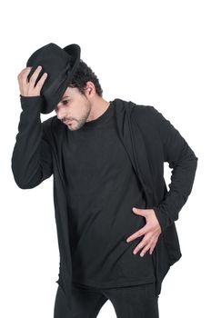 Man in black dancing with his hat, isolated on white