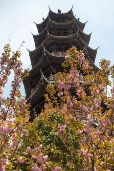 View of a chinese temple and trees in the city of Shanghai in China, 2013.