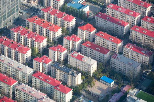 Aerial view of Shanghai with view on the residential area during the day, with a tilt shift effect. View from the Financial Center, Pudong