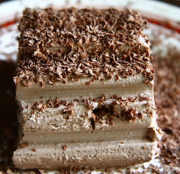 Chocolate ice cream and hardered chocolate over