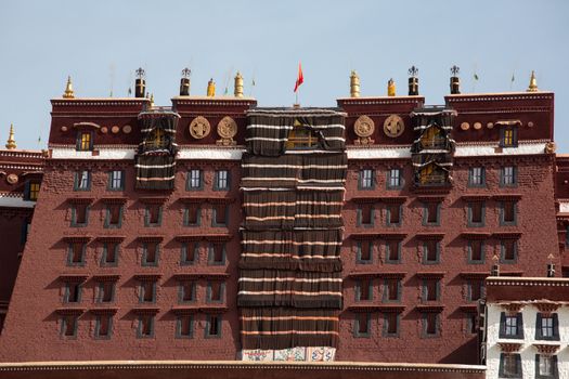 The Potala Palace, Tibet. Historic base of the different Dalai Lamas in  Lhasa, Tibet. In 2013, the palace has been converted as a museum by the Chinese government. UNESCO World Heritage site.