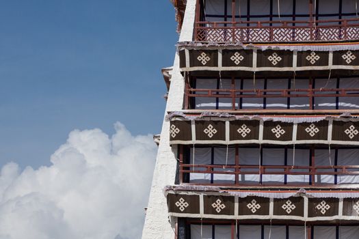 The Potala Palace in the clouds, Tibet. Historic base of the different Dalai Lamas in  Lhasa, Tibet. In 2013, the palace has been converted as a museum by the Chinese government. UNESCO World Heritage site.