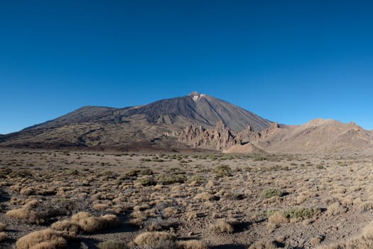 Teide in the beautiful landscape of the national park - Tenerife with the famous rock, Cinchado in the scene.