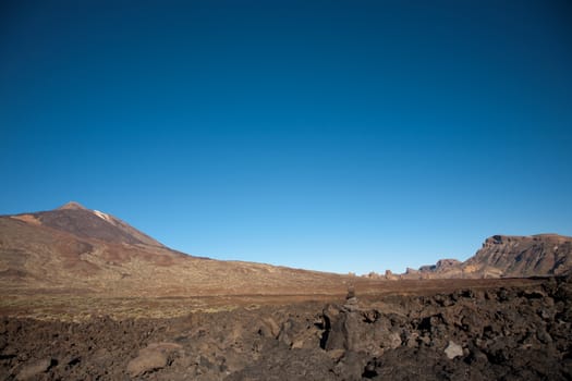 Teide in the beautiful landscape of the national park - Tenerife with the famous rock, Cinchado in the scene.
