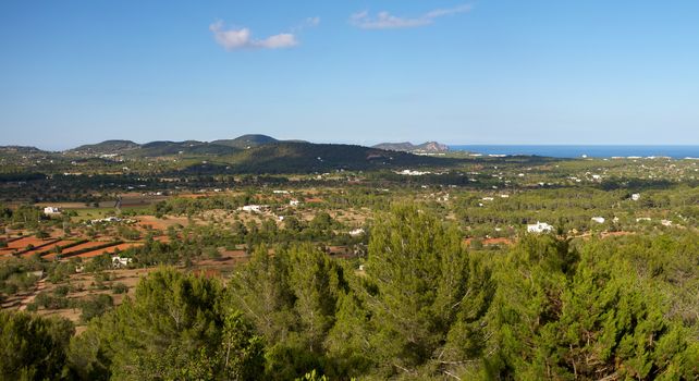 Panoramic landscape of the countryside and the sea in Ibiza
