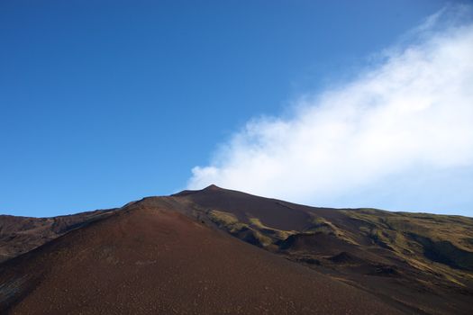 View of the Etna early in the morning with a blue sky