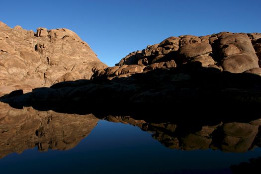 Wonderful lake in the desert of Sinai with sunrise with blue water and reflections