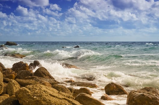 Sea waves lapping on the rocks