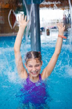 Activities on the pool. Cute girl in swimming pool