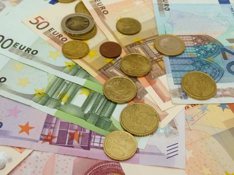 Euro (EUR) banknotes and coins money useful as a background or money concept